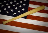 American flag and baseball bat